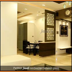 Partition Jaali sandwiched between glass copy.jpg